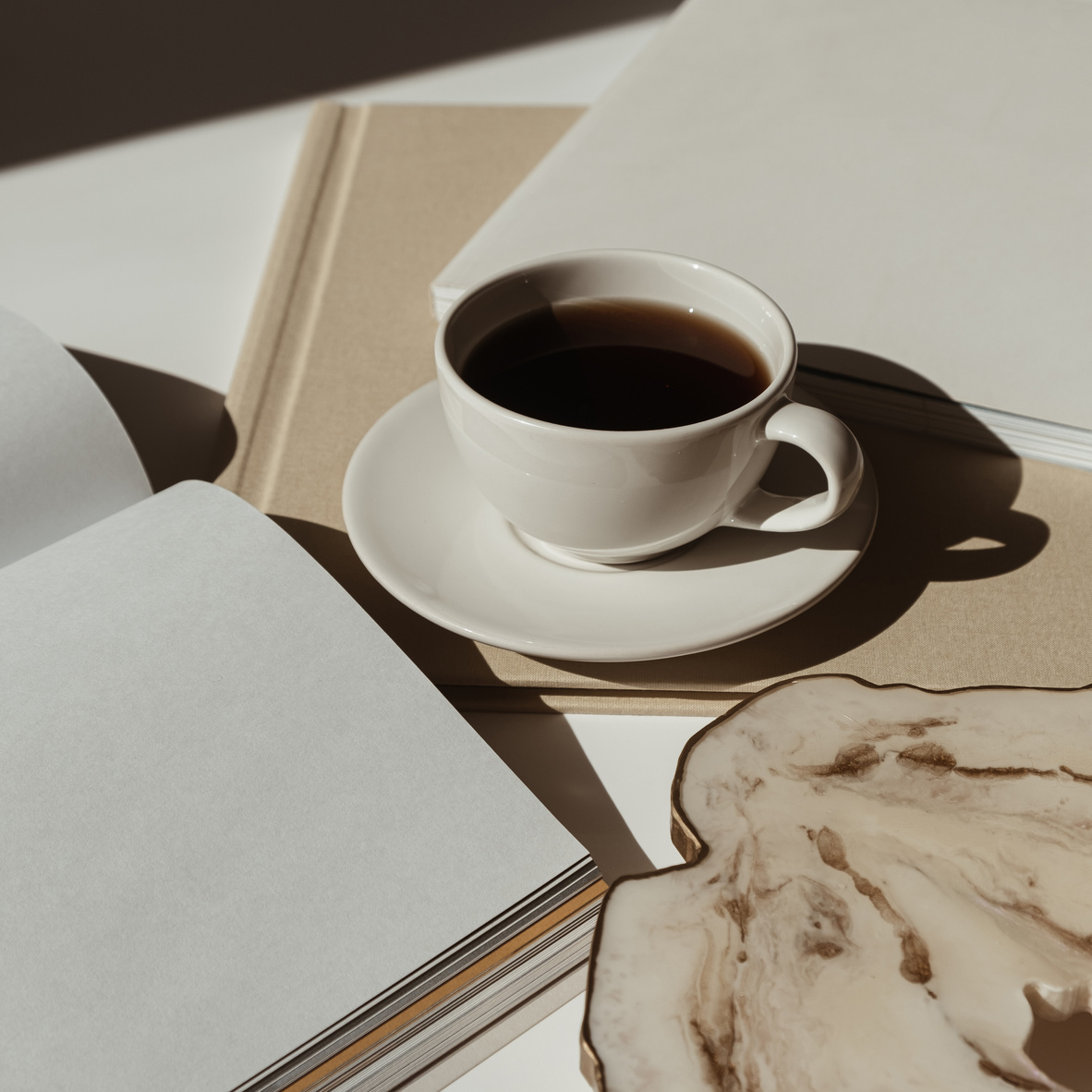 Coffee with Notebooks on Table 